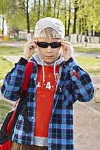 Boy in black sunglasses