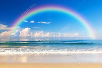 Beautiful sea with a rainbow in the sky