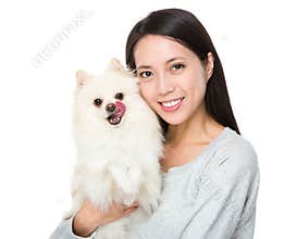 Woman with pomeranian dog