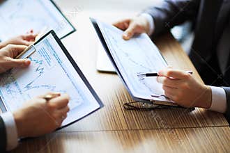 Banking business or financial analyst desktop accounting charts