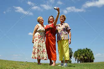 Senior friends taking photo