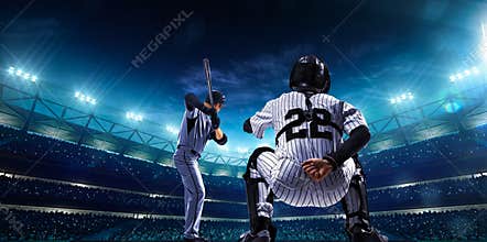 Professional baseball players on night grand arena