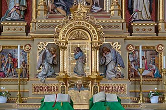 Sacred altar with wood carved Jesus Christ standing at the door