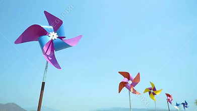 Colorful wind turbine rotating
