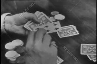 Close-up of man playing card game