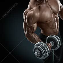 Strong and power bodybuilder doing exercises with dumbbell