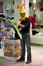 Man selling balloon animals