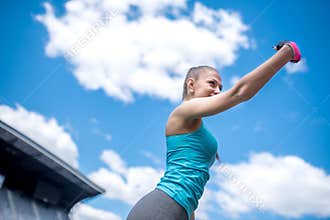 Portrait of a pretty woman taking selfie with phone camera. Modern fitness concept
