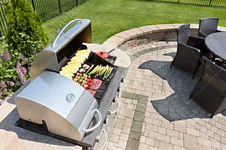 Grilling food on an outdoor gas barbecue