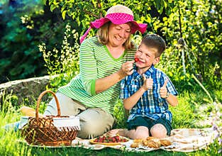 Grandmother having a picnic with grandchild