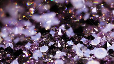 Many small brilliant jewel stones rotating