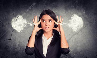 Frustrated woman holding finger to his temple
