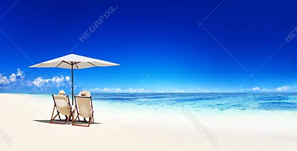 Couple Relaxing Tropical Beach Vacation Concept