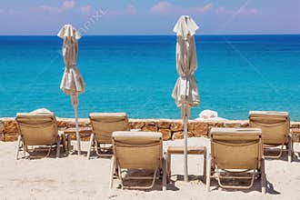 Lounge chairs on the beach in Sani, Greece