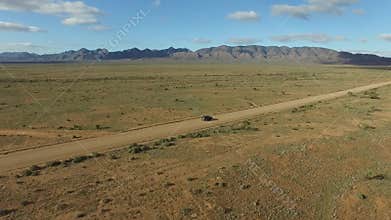 Aerial view of Outback Travelers on Dirt Road