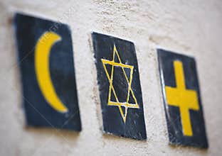Religious symbols: islamic crescent, jewish David's star, christian cross