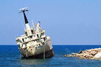 Edro III cargo ship aground near the shore of the Sea Caves at P