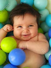 Baby in balls