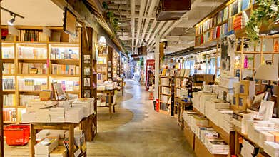 Spacious modern bookstore interior with bookshelves full of books
