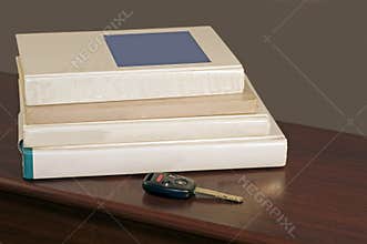 Car key and school books