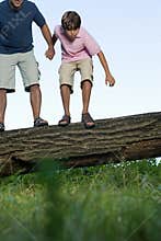 Boy looking at ground in awe