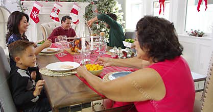 Family Saying Grace Before Christmas Meal Shot On R3D