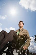 Low angle view of a disabled teenage boy