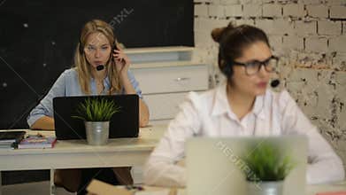 Customer support operator working in a call center