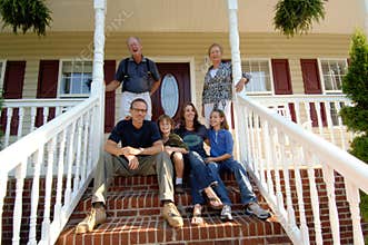 Family of three generations on porch
