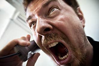 Scream of stressed man at phone