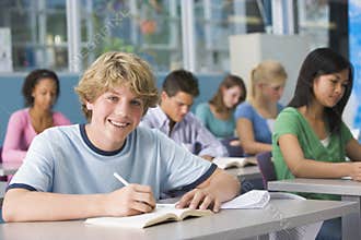 Schoolboy in high school class