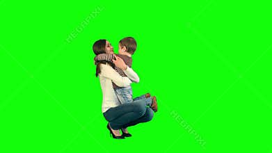 Lovely portrait of a mother and son on a Green