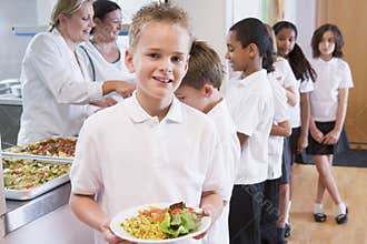 Schoolboy in a school cafeteria