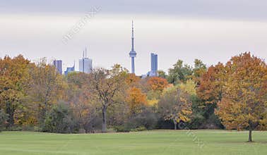 Toronto cityscape with skyscrapers and grey sky on the background.
