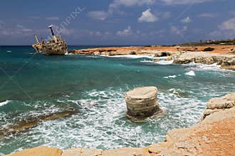 Maritime landscape - boat shipwrecked , turquoise sea with waves