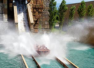 People having fun at rafting attraction