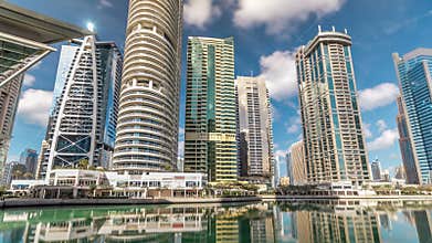 Residential buildings in Jumeirah Lake Towers timelapse in Dubai, UAE.