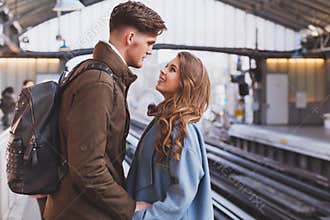 Long distance relationship, couple at the train station