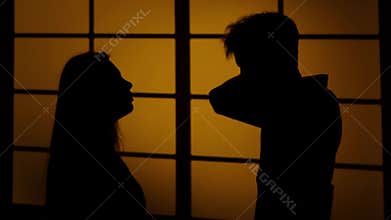 Relationship difficulties. Silhouette. Close up