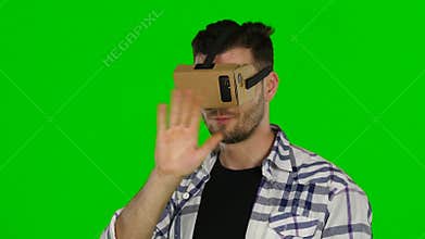 Virtual reality. VR glasses. Green screen. Close up