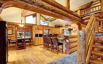 Log cabin house interior of dining and kitchen room