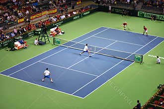 Men doubles tennis match