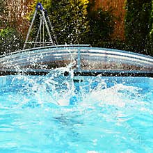 Splash in the pool Summer background for traveling.