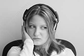 Female listening to headphones