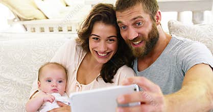 Happy family taking a selfie