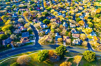 Golden Sunset Fall Colors over Home Community Suburbia Neighborhood