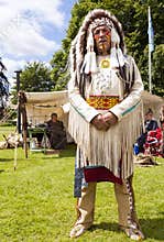 Man dressed as a native American Indian chief warrior