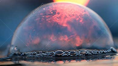 Frozen sunset - soap bubble freeze in last sulight
