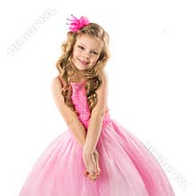 Cute little girl in pink princess dress, isolated on white background