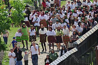 People in traditional national costume - landmark attraction in Maramures, Romania
